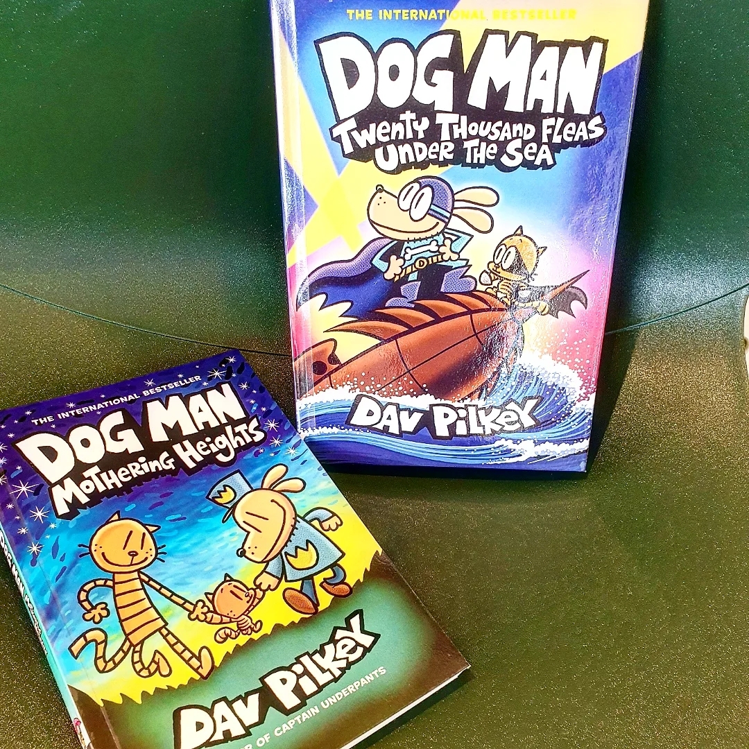 Dog man bibliotek bok